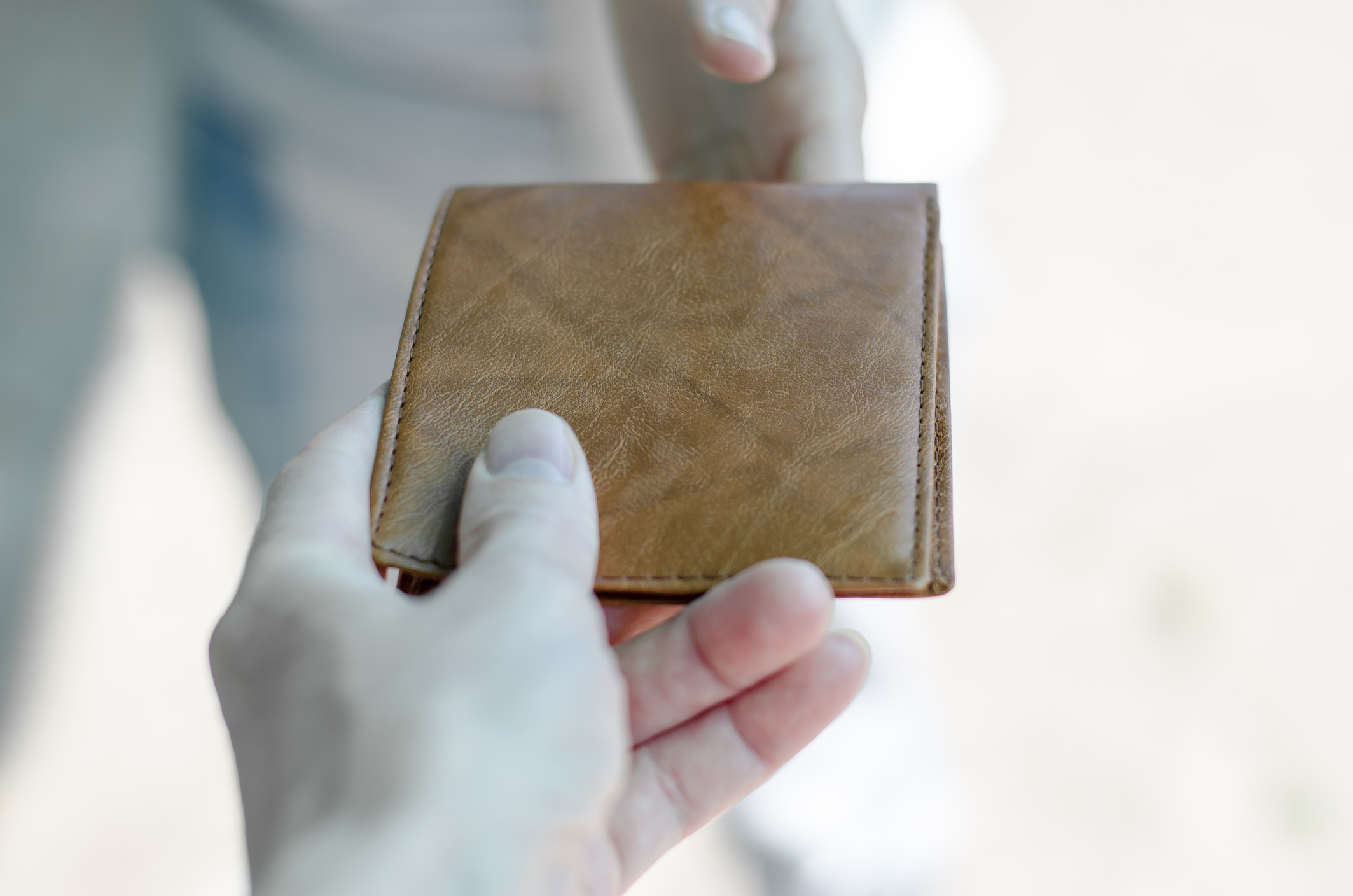 Paying for Primary Frequency Response: Double-sided Causer Pays