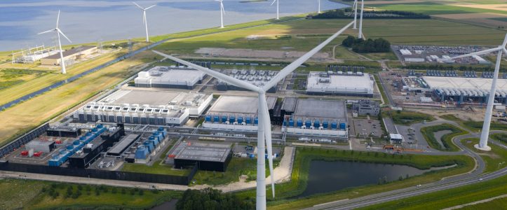 massive data center, computing center, aerial video in the Eemshaven, The Netherlands. Aerial photo.
