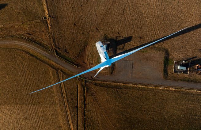 small scale wind farm comprising of two turbines servicing a small community in country Victoria, captured by a drone